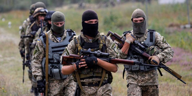 September 11, 2014: Ukrainian soldiers take part in a military exercise west of Kiev (AP)
