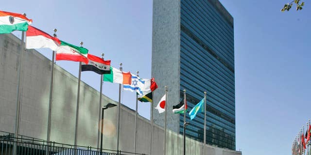 FILE - In this Sept. 18, 2007 file photo, the flags of member states fly outside United Nations headquarters. Israel on Tuesday Sept. 1, 2015 urged U.N. leaders to reject a Palestinian effort to raise their flag at headquarters as a non-member observer state as early as next month’s gathering of world leaders at the U.N. (AP Photo/Mary Altaffer, File)
