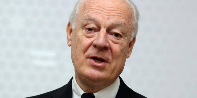 FILE - In this Feb. 13, 2015, file photo, UN Special Envoy for Syria Staffan de Mistura informs the media after talks with Austrian Foreign Minister Sebastian Kurz at the foreign ministry in Vienna, Austria. The United Nations envoy to Syria said Tuesday, Feb. 17, he has received a commitment from the Syrian government to suspend airstrikes and artillery shelling on the city of Aleppo for six weeks to allow a proposed U.N. plan to "freeze" hostilities in the country's largest city to be tested. (AP Photo/Ronald Zak, File)