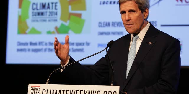 U.S. Secretary of State John Kerry delivers remarks at a NYC Climate Week opening event, at the Morgan Library in New York, Monday, Sept. 22, 2014. (AP Photo/Richard Drew)