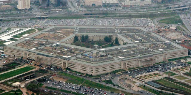 FILE - This March 27, 2008, aerial file photo shows the Pentagon in Washington. The U.S. is protesting an intercept of a U.S. reconnaissance plane by a Russian fighter jet last week, calling it "unsafe and unprofessional" amid what it views as increasingly aggressive air operations by Moscow. Pentagon spokesman Mark Wright on Sunday, April 12, 2015, said the U.S. was filing a complaint to Russia after the April 7 incident over the Baltic Sea. (AP Photo/Charles Dharapak, File)