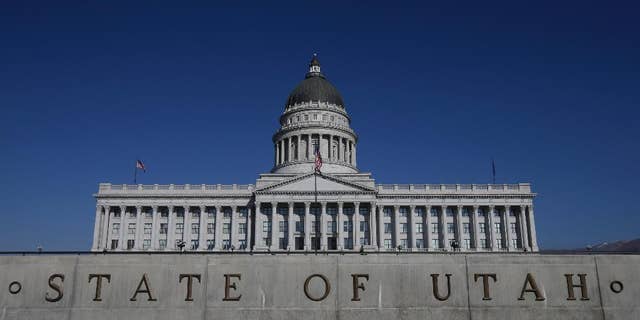 FILE - In this Jan. 26, 2015, file photo, shows the Utah State Capitol, in Salt Lake City. Utah became the only state to allow firing squads for executions Monday, March 23, 2015, when Gov. Gary Herbert signed a law approving the controversial method's use when no lethal-injection drugs are available. Herbert has said he finds the firing squad "a little bit gruesome," but Utah is a capital punishment state and needs a backup execution method in case a shortage of the drugs persists. (AP Photo/Rick Bowmer, File)