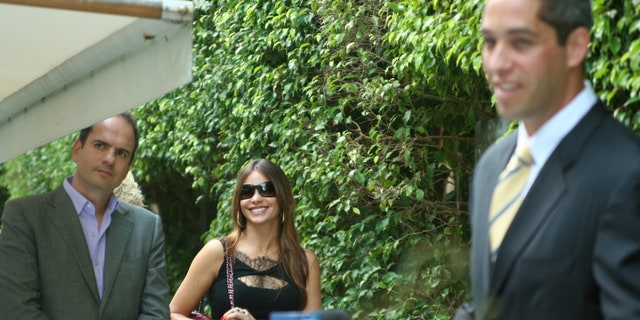 A smiling Sofia Vergara with her boyfriend, Nick Loeb, at a Miami Beach hotel shortly before he announced he did not want to run for senate. There had been much speculation that he wanted to run for statewide office.
