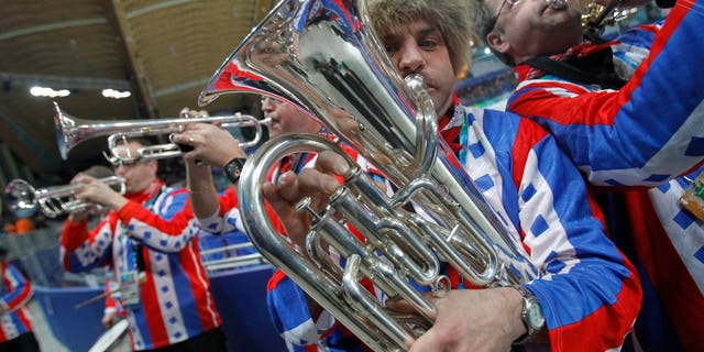 Feb. 17, 2010: This is file photo of the Dutch brass band Kleintje Pils, or Small Beer, entertains the crowd prior to the start of the men's 1000 meters race at the Richmond Olympic Oval at the Vancouver 2010 Olympics in Vancouver, British Columbia.