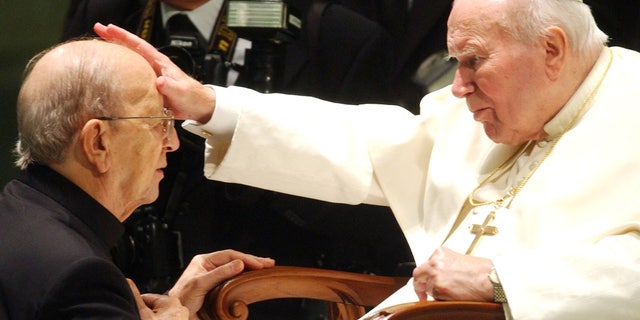 Pope John Paul II gives his blessing to late father Marcial Maciel on Nov. 30, 2004.