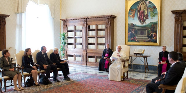 In this photo released by Vatican newspaper L'Osservatore Romano, Pope Francis meets members of the International Catholic Child Bureau, at the Vatican Friday, April 11, 2014. Pope Francis asked for forgiveness Friday from people who were sexually abused by priests, and vowed that there will be no going back in the church's fight to protect children. Francis made the off-the-cuff remarks after coming under criticism from victims' advocacy groups for a perceived lack of attention to the problem and ongoing demands that he sanction bishops who covered up for pedophiles. In his remarks to members of the International Catholic Child Bureau, a French Catholic network of organizations that protects children's rights, Francis said he felt "called to take it upon myself" and "ask forgiveness" for the evil that some priests had committed against children. "The church is aware of this damage," he was quoted as saying by Vatican Radio. (AP Photo/L'Osservatore Romano)