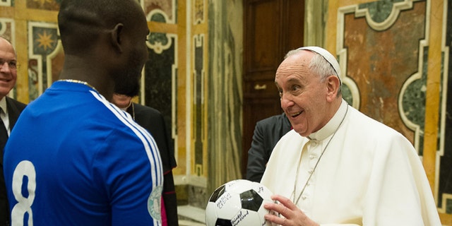 Pope Francis meets with participants of the meeting organized by the Pontifical Council " Cor Unum " and the Pontifical Commission for Latin America on the fifth anniversary of the Haiti's earthquake during a private audience at the Vatican, Saturday, Jan. 10, 2015. (AP Photo/L'Osservatore Romano, Pool)