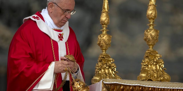 Pope Francis celebrates a Pentecost mass in St. Peter's Square at the Vatican, Sunday, May 19, 2013.( (AP Photo/Andrew Medichini)