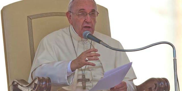 May 13, 2015: Pope Francis delivers his speech during his weekly general audience in St. Peter's Square at the Vatican.