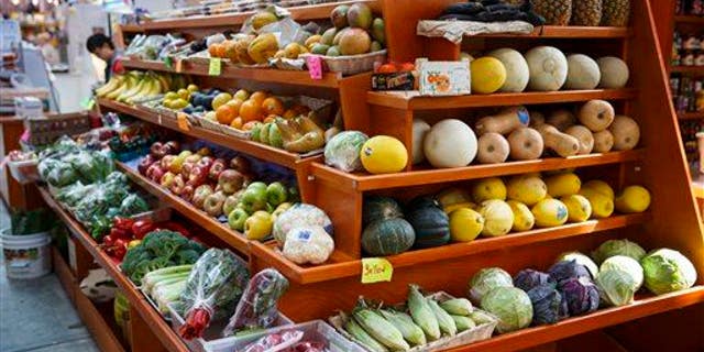 A variety of fruits and vegetables are displayed for sale at a market in Washington, Thursday, April 24, 2014.