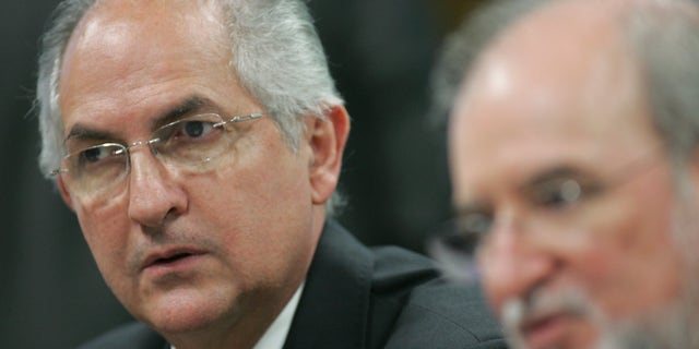 Caracas Mayor Antonio Ledezma, left, attends a meeting in senate chambers, in Brasilia, Brazil.(AP Photo)