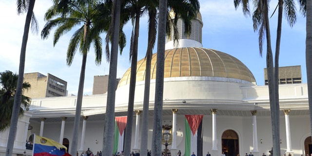 Government supporters outside the National Assembly in Caracas on October 2, 2014.