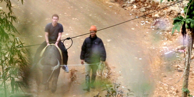 Dec. 26, 2011: Facebook-founder Mark Zuckerberg rides a water buffalo in northern resort town of Sapa in Lao Cai province. Vietnam may block its citizens from using to Facebook, but that didn't stop Zuckerberg from spending his vacation there.