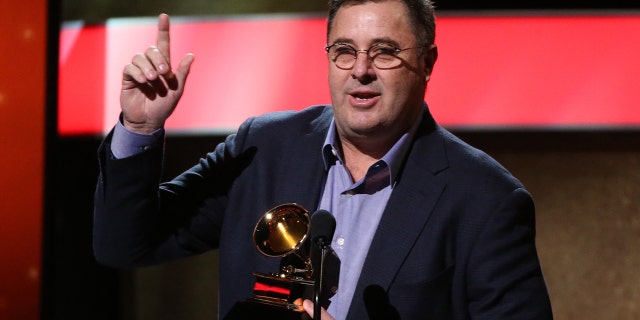 Vince Gill accepts the Grammy for American Roots Song for "Kid Sister" at the 59th Annual Grammy Awards in Los Angeles, California, U.S. , February 12, 2017.