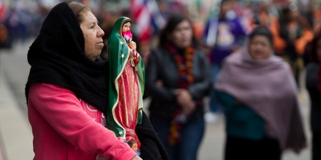 Feast of Our Lady of Guadalupe procession on Sunday, Dec. 8, 2013, in Houston.