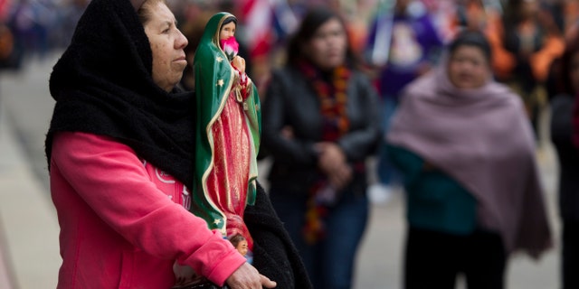 Feast of Our Lady of Guadalupe procession on Sunday, Dec. 8, 2013, in Houston.