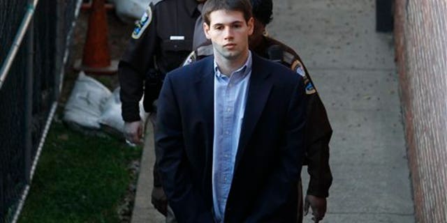 Feb. 9: George Huguely V is escorted to Charlottesville Circuit Court by members of the Charlottesville Sheriff's Office for the start of his trial in Charlottesville, Va.