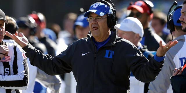 Duke coach David Cutcliffe reacts during the first half of an NCAA college football game against Virginia Tech in Durham, N.C., Saturday, Nov. 15, 2014. Virginia Tech won 17-16. (AP Photo/Gerry Broome)
