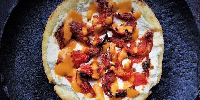 A Philadelphia, PA, restaurant has teamed up with a local distillery to launch a boozy infused pizza.