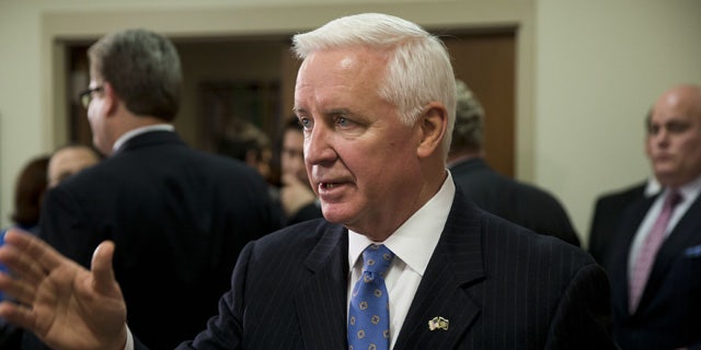 Jan. 17, 2014: Gov. Tom Corbett gestures as he responds to a question during a news conference.
