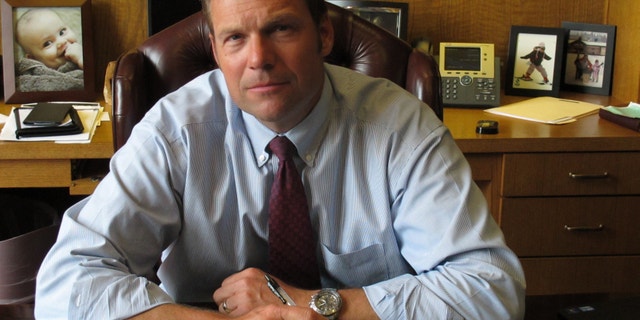 Kansas Secretary of State Kris Kobach, the architect of the state's proof-of-citizenship law for new voters, in Aug. 1, 2013.