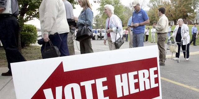 FILE: 2004: People line up to vote at Crieve Hall Elementary School in Nashville, Tenn.