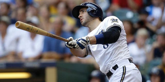 Sunday, August 16: The Milwaukee Brewers' Ryan Braun watches his grand slam against the Philadelphia Phillies during the fifth inning in Milwaukee. Braun tied Robin Yount on the franchise home run list and the Brewers won 6-1.
