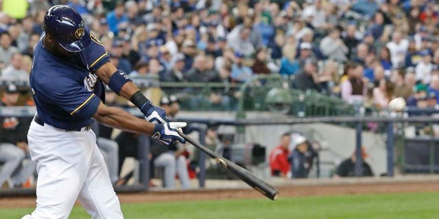 Sunday, May 1: The Milwaukee Brewers' Chris Carter hits a two-run home run during the third inning against the Miami Marlins in Milwaukee. Carter had two homers in the 14-5 win.