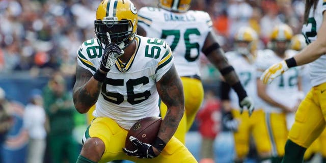 Sunday, Sept. 13: Green Bay Packers outside linebacker Julius Peppers reacts after sacking Chicago Bears quarterback Jay Cutler during the first half in Chicago.