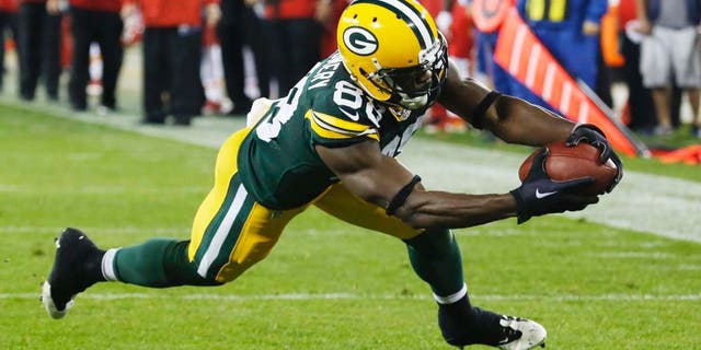 Monday, Sept. 28: The Green Bay Packers' Ty Montgomery catches a touchdown pass during the first half against the Kansas City Chiefs.