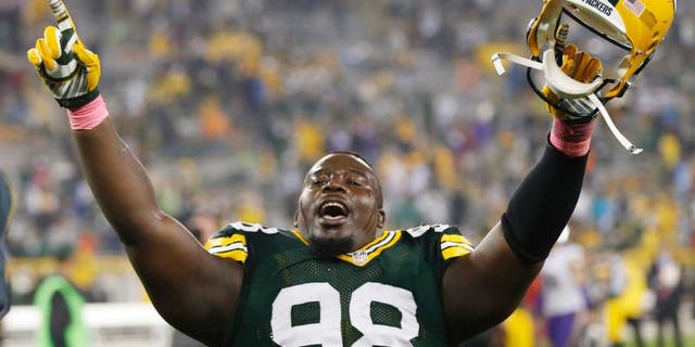 Thursday, October 2: The Green Bay Packers' Letroy Guion celebrates after the game against the Minnesota Vikings in Green Bay, Wis. The Packers won 42-10.