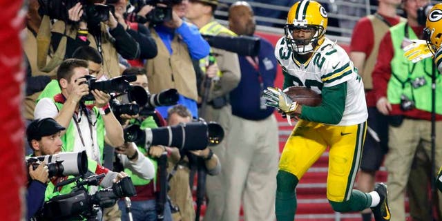 Saturday, Jan. 16: Green Bay Packers cornerback Damarious Randall celebrates his interception in the end zone against the Arizona Cardinals during the second half in Glendale, Ariz.