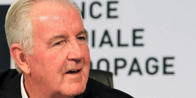 FILE - In this Friday, Nov. 15, 2013 file photo, the newly appointed World Anti-Doping Agency (WADA) president Craig Reedie takes a question during a media conference in Johannesburg, South Africa. Reedie is traveling to Jamaica to check whether the Caribbean island has put its house in order and set up an effective drug-testing program in the tiny nation that produces the world’s dominant sprinters, it was reported on Friday, Feb. 20, 2015. He will become the first WADA president to visit Jamaica, which came under scrutiny following revelations of a complete lack of out-of-competition testing among its athletes in the months before the 2012 London Olympics. (AP Photo/Themba Hadebe, FIle)