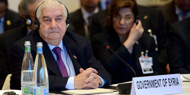 Jan. 22, 2014: Syrian Foreign Minister Walid al-Mouallem, attends the Geneva II peace talks on Syria in Montreux Switzerland.