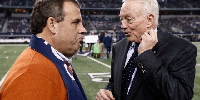 FILE: Dec. 21, 2014: New Jersey Gov. Chris Christie, left, talks with Dallas Cowboys team owner Jerry Jones, at an NFL football game in Arlington, Texas.