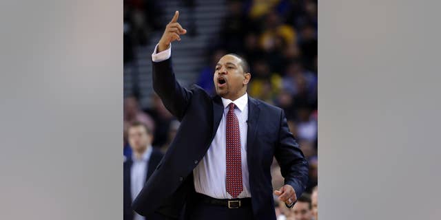 FILE - In this Thursday, Feb. 6, 2014, Golden State Warriors head coach Mark Jackson instructs his team during the first half of an NBA basketball game against the Chicago Bulls in Oakland, Calif. The Warriors fired Jackson on Tuesday, May 6, 2014. (AP Photo/Marcio Jose Sanchez, File)