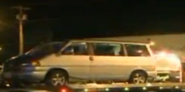 Mar. 11, 2012: Police tow a van as evidence after a police officer's daughter was accidentally shot by her brother inside it.