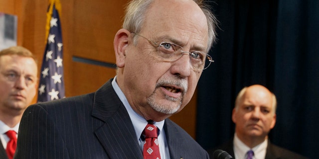 FILE - This Feb. 4, 2014 file photo shows Rep. Norman 'Doc' Hastings, R-Wash., during a news conference at the Capitol in Washington. (AP Photo/J. Scott Applewhite, file)