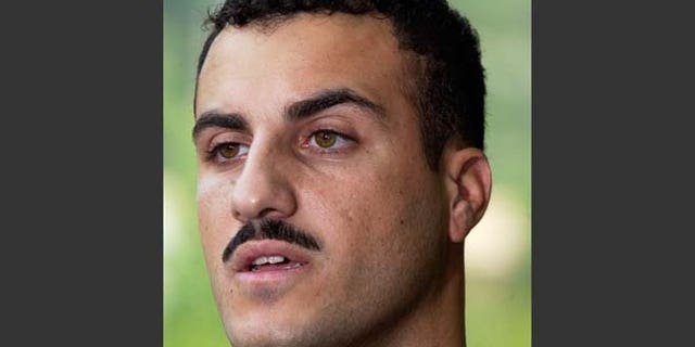July 19, 2004: In this file photo, Marine Cpl. Wassef Ali Hassoun makes a statement to the media outside Quantico Marine Base in Quantico, Va.