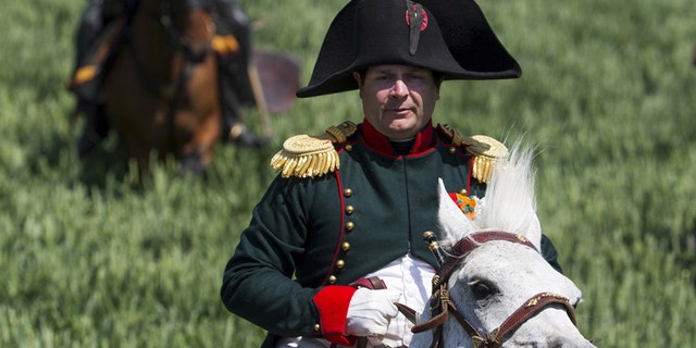 File photo - Frenchman Frank Samson takes part in the re-enactment of the battle of Ligny, as French Emperor Napoleon, during the bicentennial celebrations for the Battle of Waterloo, in Ligny, Belgium, June 14, 2015.