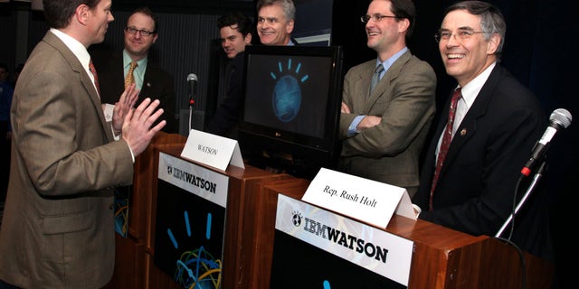 In this photo taken by Feature Photo Service for IBM: Dr. Eric Brown from IBM Research preps four members of congress - Jared Polis (D-Colo.), Bill Cassidy (R-La.), Jim Himes (D-Conn.), Rush Holt (D-N.J.) - for an exhibition game against IBM's Watson on Monday, Feb. 28, 2011. (AP)