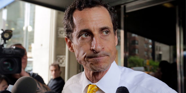 New York City mayoral candidate Anthony Weiner leaves his apartment building in New York.