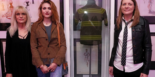 Frances Cobain with grandmother Wendy O'Connor and aunt Kim Cobain at the "Museum of Style Icons' Growing Up Kurt Cobain" exhibition in Ireland on Tuesday.