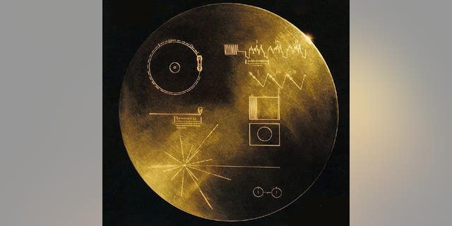 A 12-inch gold-plated copper disk, one of NASA's original golden records.