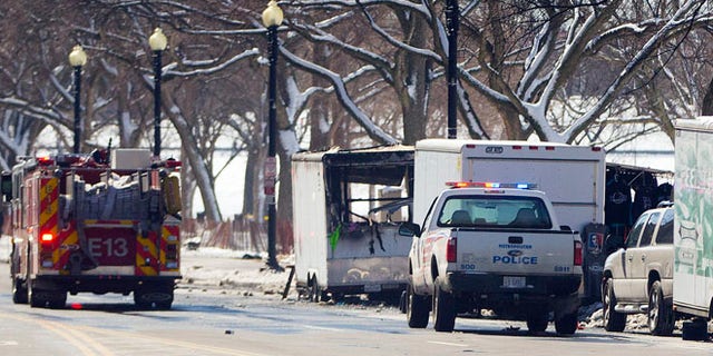 March 7, 2015: Police and fire vehicles along 15th St. NW near the White House, near a vendor cart that caught on fire, Washington, D.C.