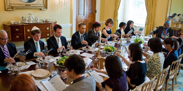 President Barack Obama and First Lady Michelle Obama mark the beginning of Passover with a Seder in the Old Family Dining Room of the White House, April 18, 2011. (Official White House Photo by Pete Souza)