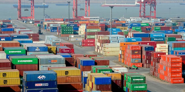 Dec. 10, 2011: A truck leaves a port in Nanjing in east China's Jiangsu province in this file photo.