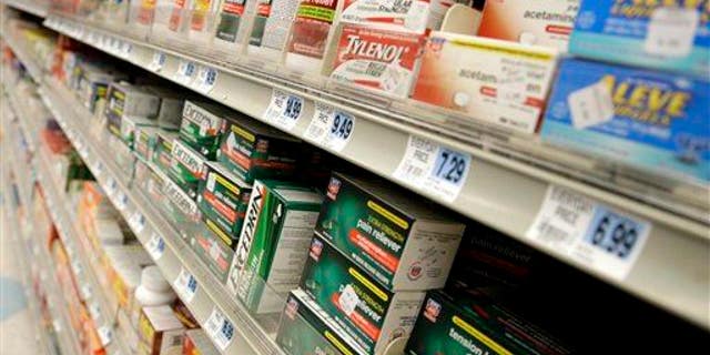 This photo taken March 10, 2013 shows non-prescription drugs displayed at a pharmacy in New York.