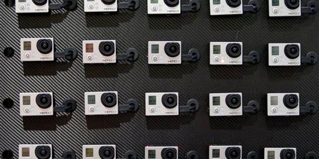 This Jan. 8, 2013 file photo shows a display of video cameras at the International Consumer Electronics Show in Las Vegas.
