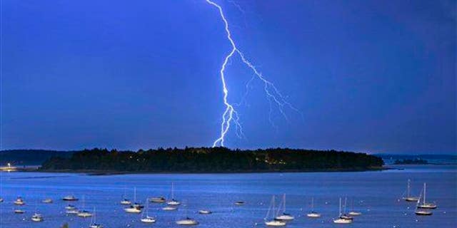 Lightning strikes north of Mackworth Island in Maine, on Sept. 11, 2013.